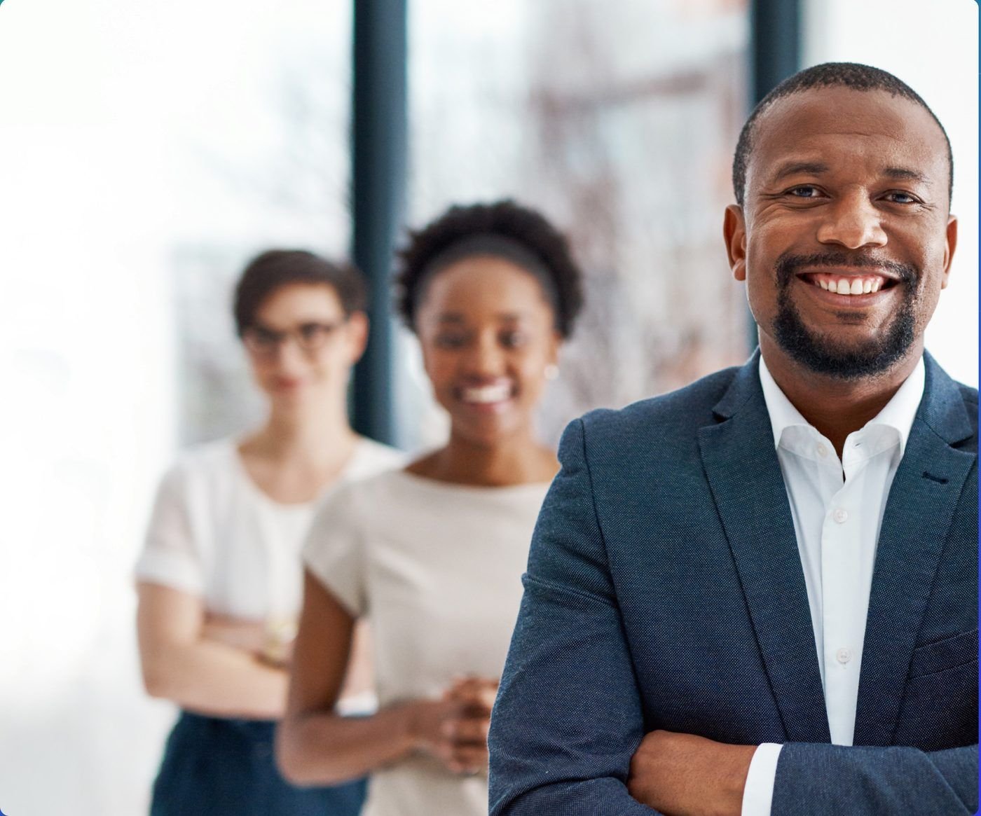 A TechClan team lead with colleagues behind